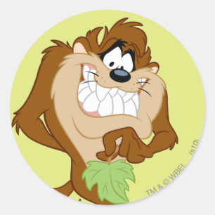 Sticker Rond TAZ™ tenant une feuille