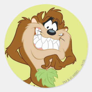 Sticker Rond TAZ™ tenant une feuille