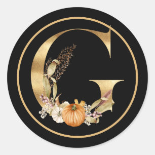 STICKER ROND THÈME DE LA CHUTE MONOGRAMME D'OR G AVEC CITROUILL