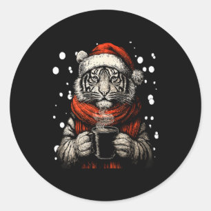 Sticker Rond Tigre de Noël avec chapeau de Père Noël amateur de