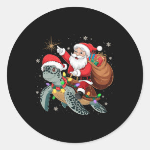 Sticker Rond Tortue drôle de Noël Santa à cheval sur une tortue