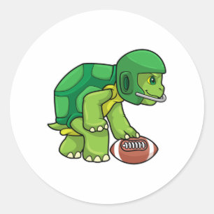 Sticker Rond Tortue en sport avec football et casque