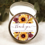 Sticker Rond Tournesol Bourgogne Mariage Floral Merci<br><div class="desc">Cet autocollant mariage rustique présente un design floral d'aquarelle luxuriant composé de tournesols jaunes et de feuillage bordeaux. Les mots "merci" apparaissent dans la calligraphie élégante de l'écriture bordeaux avec des swashes au début et à la fin. Ajoutez les noms du couple et la date du mariage ci-dessous.</div>