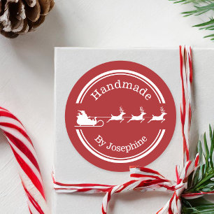 Sticker Rond Traîneau de Noël du Père Noël rouge et blanc fait 