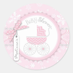 Sticker Rond Transport de bébé rose et flocon de neige d'hiver