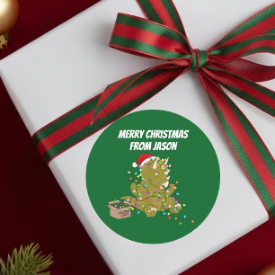 Sticker Rond Triceratops drôle emmêlé dans les lumières de Noël