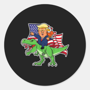 Sticker Rond Trump À cheval Sur Un Dinosaure Trex Drôle Merica