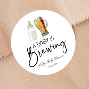 Sticker Rond Un Bébé Brasse Une Bouteille Baby shower De Verre