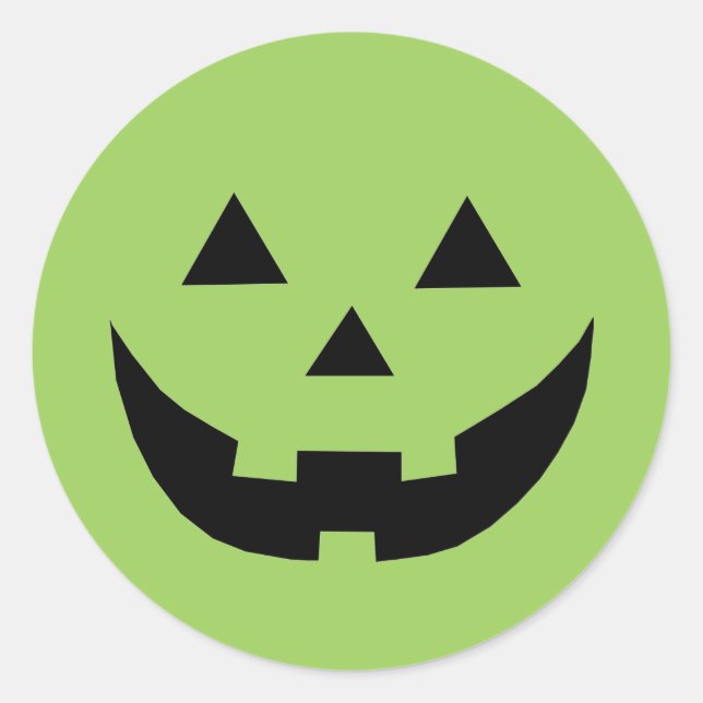 Sticker Rond Un citrouille Jack-o'-lantern vert amusant face Ha (Devant)