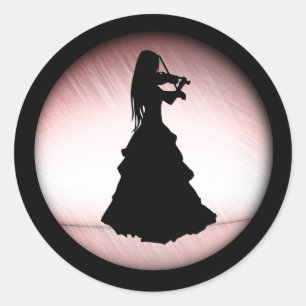 Sticker Rond Une fille tzigane joue du violon