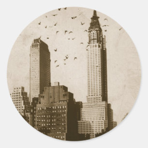 Sticker Rond Une volée de voler d'oiseaux