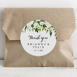Sticker Rond Verdure Blanc Floral Merci Mariage Faveur<br><div class="desc">Ce sticker vert blanc floral merci mariage faveur classique rond est parfait pour un mariage rustique. Le design est doté d'élégantes pivoines blanches aquarelles avec feuillage vert. Faites de l'autocollant votre propre étiquette en incluant vos noms, l'événement (s'il y a lieu) et la date. Ces autocollants peuvent compléter une réception...</div>