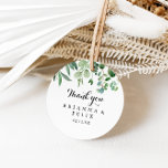 Sticker Rond Verdure Eucalyptus Merci Mariage Faveur<br><div class="desc">Cette calligraphie moderne merci mariage faveur classique collant rond est parfait pour un mariage rustique. Le design sobre et élégant présente une typographie de script classique et sophistiquée en noir et blanc. Faites de l'autocollant votre propre étiquette en incluant vos noms, l'événement (s'il y a lieu) et la date. Ces...</div>