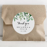 Sticker Rond Verdure Eucalyptus Merci Mariage Faveur<br><div class="desc">Cette calligraphie moderne merci mariage faveur classique collant rond est parfait pour un mariage rustique. Le design sobre et élégant présente une typographie de script classique et sophistiquée en noir et blanc. Faites de l'autocollant votre propre étiquette en incluant vos noms, l'événement (s'il y a lieu) et la date. Ces...</div>