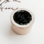 Sticker Rond Verdure Noir et Or Merci Mariage Faveur<br><div class="desc">Entrez dans un monde d'enchantement avec notre vert noir et or merci mariage faveur classique collant rond, parfait pour votre mariage botanique de printemps. Orné d'eucalyptus vert sauge et d'accents dorés, cet autocollant de faveur de mariage, exsude l'élégance et la fantaisie moderne. Imaginez vous promener dans un jardin d'été magique,...</div>