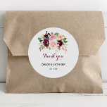 Sticker Rond Vert Broussailleux Bourgogne Merci Floral Favorise<br><div class="desc">Ces autocollants verts bordeaux vous remercient de la couleur ronde classique et sont parfaits pour un mariage rustique. Le design se compose d'élégants bouquets de fleurs dessinés à la main, verts, rousses, violets, rouges et bordeaux, inspirant la beauté naturelle. Faites de l'autocollant votre propre étiquette en incluant vos noms, l'événement...</div>