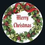 Sticker Rond Vintage Christmas Holly Wreath avec ruban rouge<br><div class="desc">Cette Serre de Noël Vintage Holly avec Ruban Rouge fait un doux ajout à vos cartes de fin de année et cadeaux de Noël.</div>