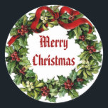 Sticker Rond Vintage Christmas Holly Wreath avec ruban rouge<br><div class="desc">Cette Serre de Noël Vintage Holly avec Ruban Rouge fait un doux ajout à vos cartes de fin de année et cadeaux de Noël.</div>