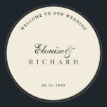 Sticker Rond Vintage Ivory and Black Old Money Wedding Welcome<br><div class="desc">Create a refined first impression with this ivory and black old money wedding welcome sticker, inspired by timeless vintage elegance and classic monochrome styling. The sophisticated ivory and black palette makes it perfect for luxury weddings, rehearsal dinners, engagement celebrations, welcome gift bags, and elegant wedding receptions. Ideal for sealing welcome...</div>