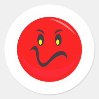 Sticker Rond visage rouge furieux