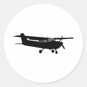 Sticker Rond Vol noir classique de silhouette de Cessna