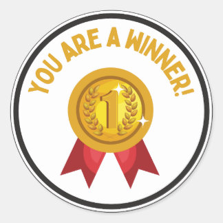 Sticker Rond Vous êtes un gagnant or et rouge numéro un ruban