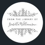 Sticker Rond Whimsy botanique "From the Library of" Plaque de l<br><div class="desc">Montrez à vos livres préférés un peu d'amour et gardez-les dans votre collection personnelle avec cet autocollant Boho Botanical From the library of Bookplate. Avec des feuilles dessinés à la main qui encadrent une police sans serif moderne pour votre message et un script chic et féminin pour votre nom. Cliquez...</div>