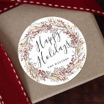 Sticker Rond Winter Red Berry Wreath Joyeuses vacances<br><div class="desc">sticker de couronne de canneberge rouge de Noël avec script "Happy Holidays" et texte personnalisé. Pour une personnalisation plus avancée de cette conception,  cliquez sur le lien "customiser plus loin".</div>