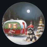 Sticker Rond Winter Schnauzer Caravan Christmas Adventure<br><div class="desc">Laissez-vous tenter par la magie d'une nuit d'hiver enneigée alors qu'une caravane glisse gracieusement à travers le paysage illuminé par la lune. La beauté sereine de la neige scintillante et l'éclat enchanteur de la lune créent une scène captivante, promettant une aventure de Noël inoubliable remplie de chaleur, de joie et...</div>