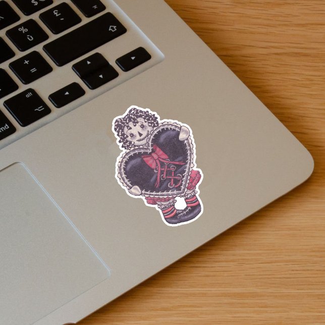 Sticker Spooky Rag Doll Yarn Hair Big Black Heart Red Bow (Spooky rag doll pale face black yarn look hair with black heart red bow on vinyl sticker.)