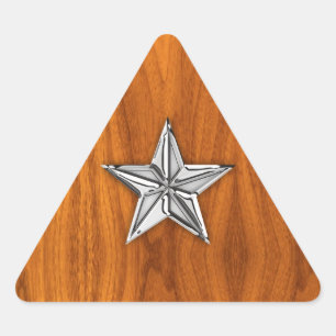 Sticker Triangulaire Style Chrome Star nautique sur le plateau de teck
