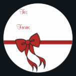 Stickers Bow Christmas<br><div class="desc">Un grand arc de fête traditionnel rouge foncé décore ces étiquettes cadeaux. Utilisez ces autocollants de marque-cadeau pour les produits de boulangerie, les biscuits de Noël, les cookies, les cadeaux de Noël, les paquets de Noël, comme lâques de cuisine, échange de cookies, échange de cookies, paquets, cadeaux, etc... Les conceptions...</div>