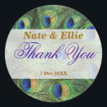 Stickers Merci de mariage Peacock<br><div class="desc">Stickers Merci Mariage Peacock Feather. GreDesign présente des plumes de paon arrière - plans dans des verts et des bleus profonds. Le libellé,  la couleur du texte et le style peuvent être modifiés dans le menu "Personnaliser"</div>