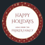 Stickers Red Gold Christmas Stars Nommés<br><div class="desc">Il s'agit d'un modèle personnalisable qui permet de modifier le nom de famille. Le code hexadécimal de couleur rouge est #650000 et correspond à d'autres articles de notre collection de fournitures d'emballage de Noël rouge. L'arrière - plan de l'autocollant est rouge foncé avec des étoiles dorées et correspond au papier...</div>