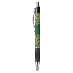 Stylo Dentelle d'or de feuille sur l'arrière - plan ver