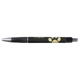 Stylo Paw chien brillant or sur arrière - plan noir