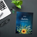 Sunflowers jaune bleu ciel nom 2025<br><div class="desc">Restez organisé et inspiré tout au long de l'année avec notre Tournesol Personnalisé et Eucalyptus Spiral Planner. Conçu pour apporter une touche de beauté naturelle à votre planification quotidienne, ce planificateur en spirale combine fonctionnalité et flair personnalisé. Arrière - plan de ciel bleu foncé : Le fond bleu profond du...</div>
