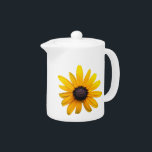 Susan Teapot aux yeux noirs<br><div class="desc">La Susan aux yeux noirs représente l'encouragement en langue fleurie. Ce design présente une véritable image de fleur de chaque côté de la théière. Les tapis et les assiettes sont également disponibles dans ce design.</div>