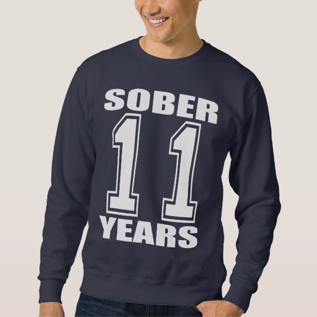 Sweatshirt Assagissez 11 ans de blanc sur l'obscurité (Devant)