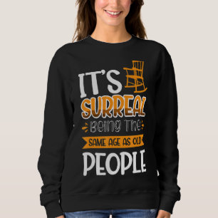 Sweatshirt C'est surréaliste être le même âge que les personn