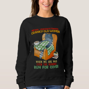 Sweatshirt Chat ne sous-estime jamais Cranky vieilles femmes