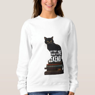 Sweatshirt Chat noir sur livres "Skip to Weekend"