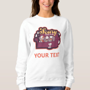 Sweatshirt Club de film d'horreur Peanuts sur le canapé d'Hal