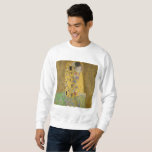 Sweatshirt Gustav Klimt Le Baiser<br><div class="desc">The Kiss est le tableau le plus emblématique et le plus célèbre de Gustav Klimt. C'est un beau tableau doré d'un couple profondément amoureux partageant un moment romantique d'un baiser passionné. Obtenez vos idées cadeaux de haute qualité et des produits merveilleux avec ce merveilleux chef-d'oeuvre. Consultez notre boutique pour en...</div>