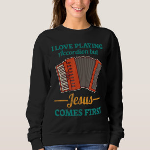 Sweatshirt J'adore jouer de l'accordéon mais Jésus passe avan