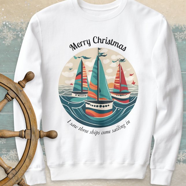 Sweatshirt J'Ai Vu Trois Navires Voiliers Océan Noël (A nautical Christmas sweatshirt with 'I saw three ships' theme and picture of boats on the ocean)