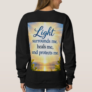 Sweatshirt La lumière m'entoure, me guérit et me protège.