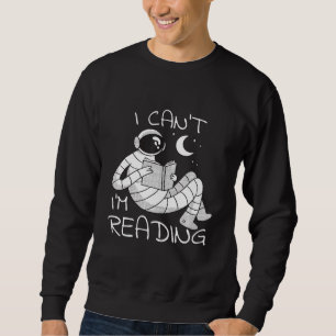 Sweatshirt L'astronaute Lit Un Ver De Livre
