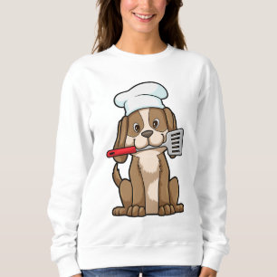 Sweatshirt Le chien cuisinier avec le casquette et la spatule