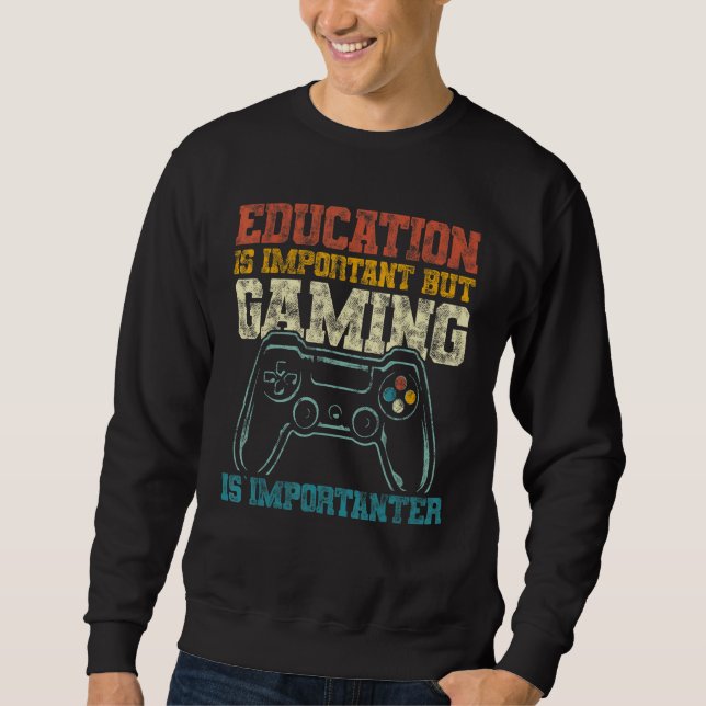 Sweatshirt L'Éducation Est Importante, Mais Le Jeu Est Import (Devant)